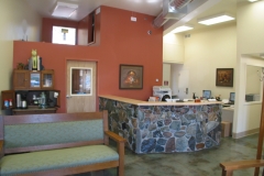 Reception area with stone desk surround